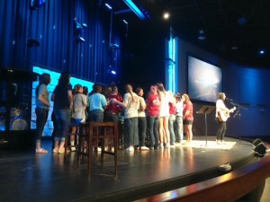 Young women giving their lives to Christ.
