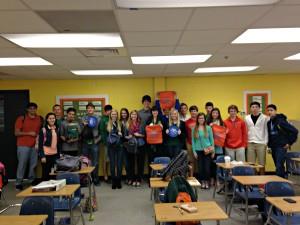 huddle-300x225 Mosley HS Huddle members display Manna Bags they assembled for their beach ministry.