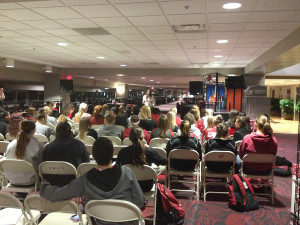 Shefchunas speaking to female athletes at the University of Arkansas